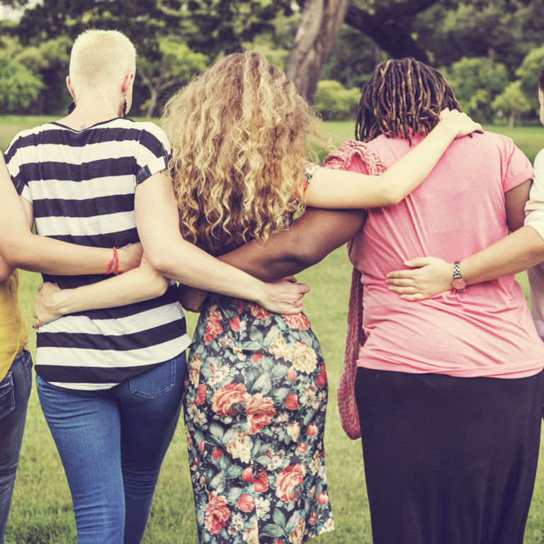 ladies embracing each other around waist ladies embracing each other around waist