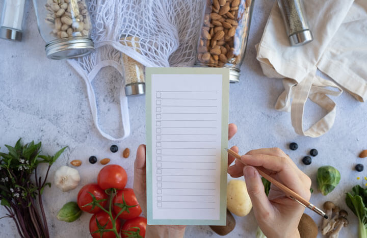 hand writing a shopping list
