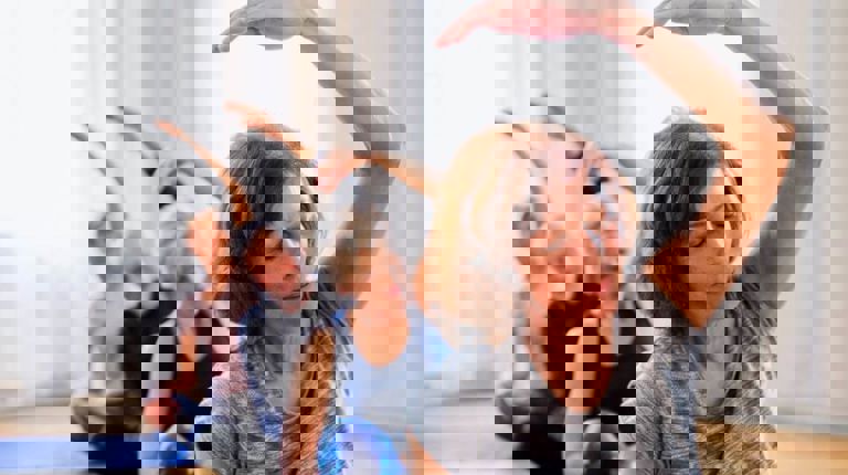 people sitting on the floor doing yoga people sitting on the floor doing yoga