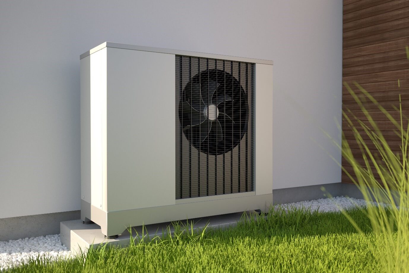 white heat source pump attached to an external wall