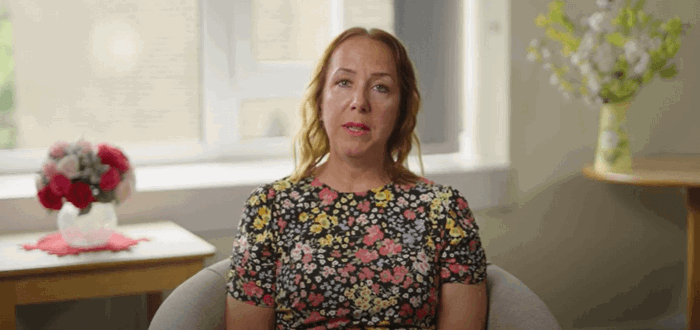 lady sitting on a couch lady sitting on a couch