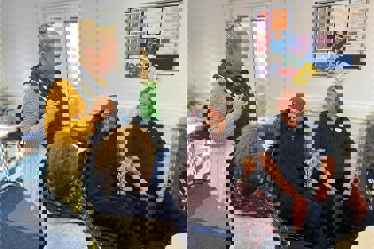 Photo of people talking at a community event Photo of people talking at a community event