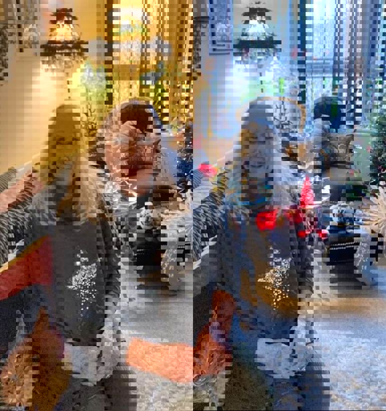 Orbit customer Sandy sat with her christmas decorations Orbit customer Sandy sat with her christmas decorations