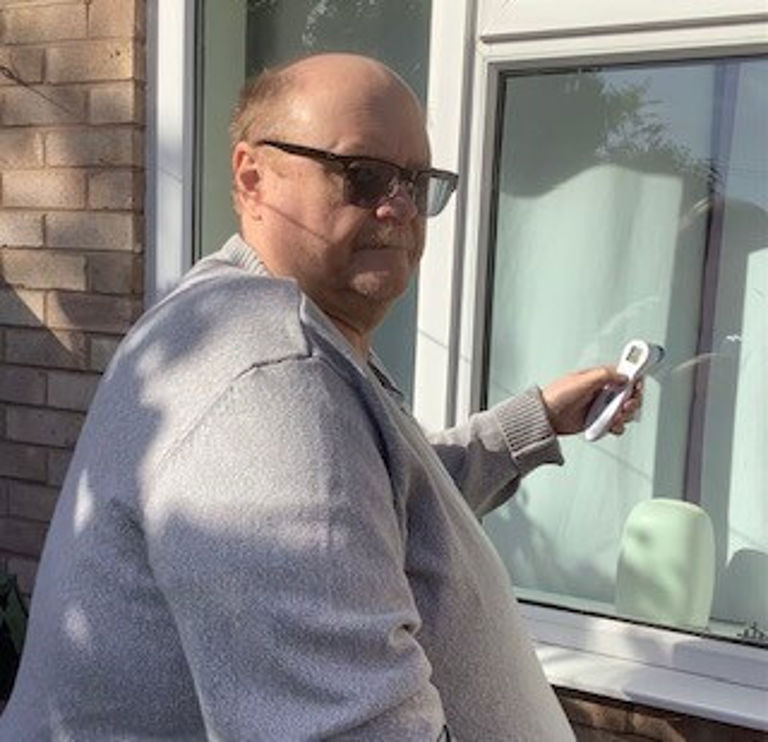 Ron checking heat loss through his window Ron checking heat loss through his window