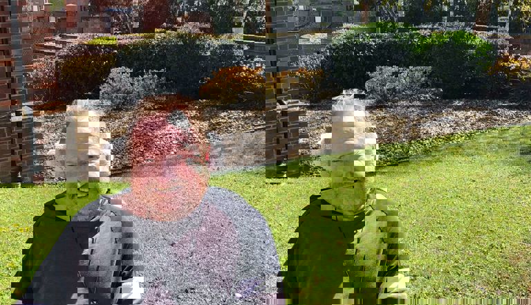 man sitting in a garden man sitting in a garden