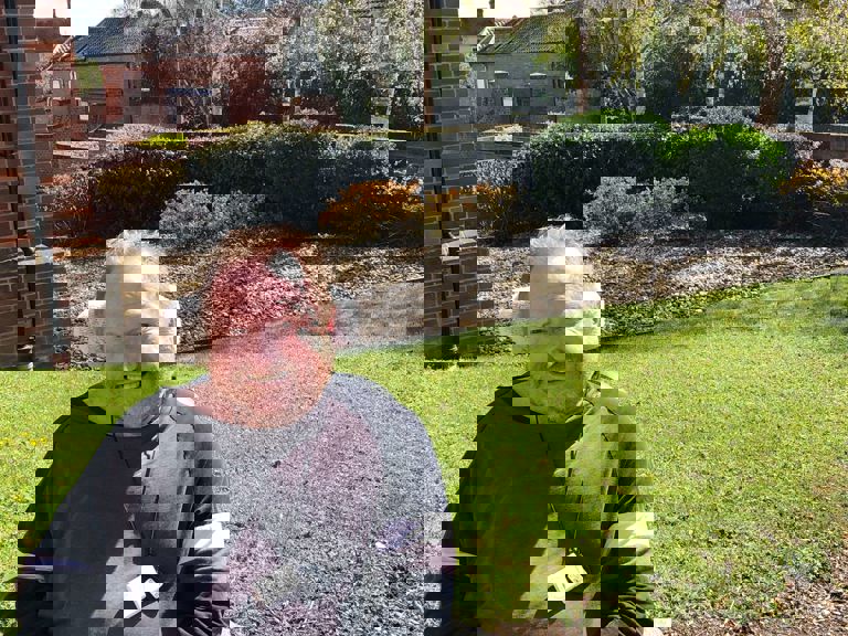 man sitting in a garden man sitting in a garden